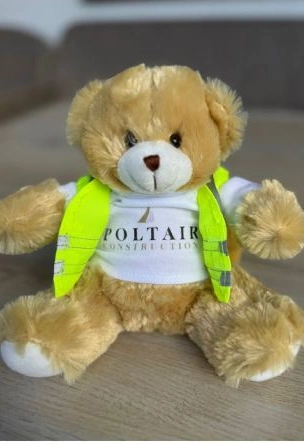 Polly Bear wearing a Poltair construction vest